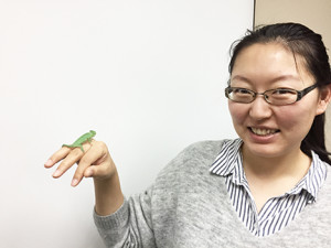 Woman and baby chameleon